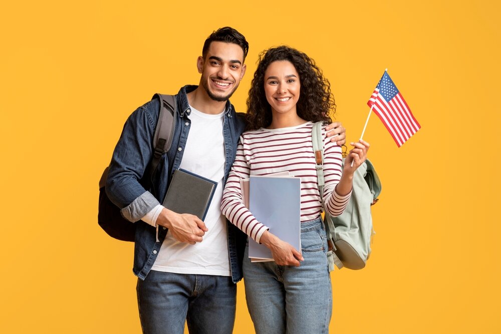 Study,Abroad,Smiling,Middle,Eastern,Students,Couple,Posing,With,American
